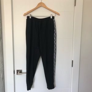 Black Fila sweatpants with stripe down the side